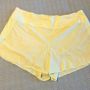 Athleta Run With It Short, size XL. 4.5” length, Light yellow-green, summer cool